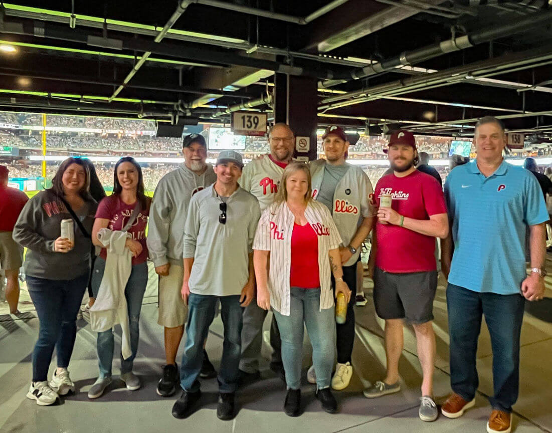 A group of Trio Capital worked at a Philadelphia Phillies baseball game